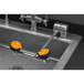 A Guardian Equipment AutoFlow deck mounted eye and face wash station with two orange faucets.