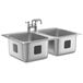 A Waterloo stainless steel double sink with two faucets.