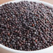 A bowl of Regal black mustard seeds.