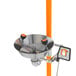 A stainless steel Guardian Equipment eye wash station with orange hand and foot controls.