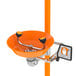 A Guardian Equipment eye wash station with an orange bowl and black handle.