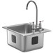A silver stainless steel sink with an 8" gooseneck faucet.