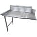 A stainless steel Advance Tabco dishtable with a hole for a sink and a metal frame.