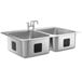A stainless steel double bowl drop-in sink with a faucet.