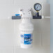 A white C Pure Oceanloch-S water filtration system with a pressure gauge attached.
