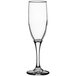 A clear Libbey wine flute with a long stem.