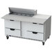 A Beverage-Air stainless steel commercial kitchen counter with 4 drawers.