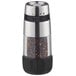 An OXO pepper grinder with a black and silver lid.