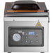 The VacPak-It Ultima vacuum packing machine with a black lid and buttons on a digital display.