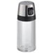 An OXO salt shaker with a silver top and glass container.
