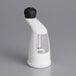 An OXO white and black pepper mill.