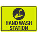 A yellow and black aluminum sign with a hand and a faucet and the words "Hand Wash Station"
