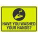 A yellow and black sign that says "Have You Washed Your Hands?" with a hand washing a faucet.