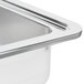 A close-up of a Vollrath stainless steel water pan.