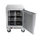 A silver Beverage-Air undercounter refrigerator with black trays inside.