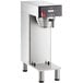 A silver Estella Caffe automatic single shuttle coffee maker with a stainless steel base and black and grey accents.