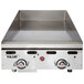A Vulcan commercial liquid propane chrome top griddle/grill on a counter.