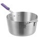 A close-up of a Choice aluminum sauce pan with a purple silicone handle.