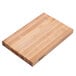 A John Boos maple wood cutting board with hand grips.