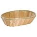 An oval natural-colored polypropylene and steel Tablecraft bread basket with a handle.