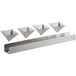A metal rack holding three silver pyramid-shaped molds.