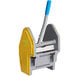 A yellow and grey plastic Lavex down press mop wringer with a blue handle.