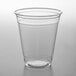 A clear plastic Choice Heavy Weight cold cup on a white surface.