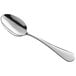 An Acopa Vernon stainless steel serving spoon with a silver handle and spoon.