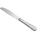 An Acopa stainless steel table knife with a textured handle.