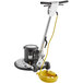 A Lavex floor cleaning machine with a yellow cord and handle.
