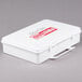 A white Medi-First first aid kit box.