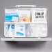 A white Medi-First first aid kit box with various first aid items inside.