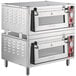 A silver rectangular Avantco countertop pizza oven with knobs and glass doors.