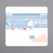 A roll of white square Ishida Safe Handling labels with blue text.