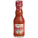 A close-up of a bottle of Frank's RedHot Original Cayenne Pepper Sauce.