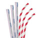 A close-up of three Aardvark red and white striped paper straws.