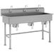 A stainless steel Advance Tabco multi-station hand sink with 3 faucets.