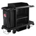 A black Suncast housekeeping cart with black bags on it.