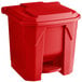 A red plastic Lavex rectangular step-on trash can with a lid.
