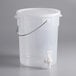 A clear plastic Choice 6 gallon round dispenser with a handle and a lid.