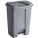 A grey Lavex rectangular step-on trash can with a lid.