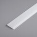 A white plastic upper blade for a dough sheeter.