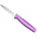 A purple Choice serrated edge paring knife with a purple handle.