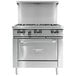 A stainless steel Garland commercial gas range with a griddle and storage base.