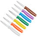 A 7 pack of Choice paring knives with different colored handles.