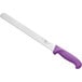 A white and purple Choice bread knife with a purple handle.