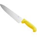 A Choice chef knife with a yellow handle.