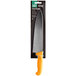 A Choice chef knife with a neon orange handle and a yellow blade in a package.