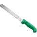 A Choice bread knife with a green handle.