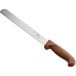 A Choice bread knife with a brown handle.
